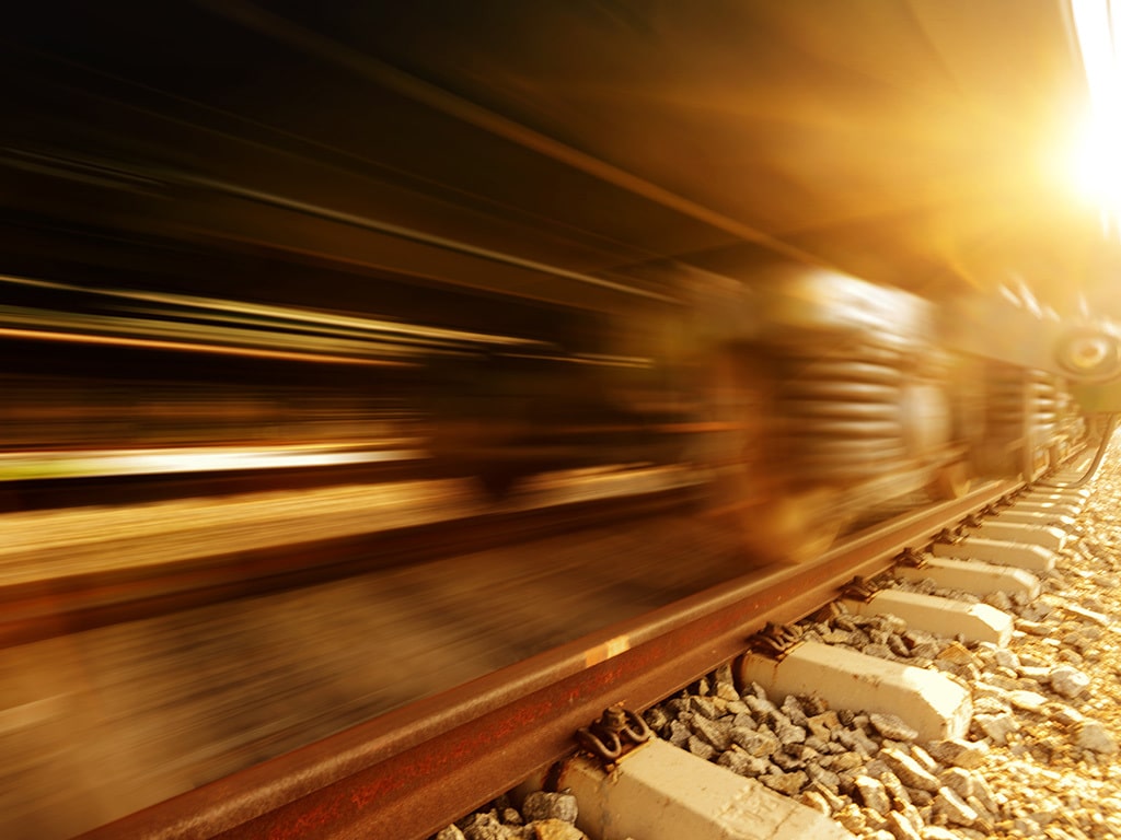 Cargo,Train,Platform,At,Sunset,With,Container