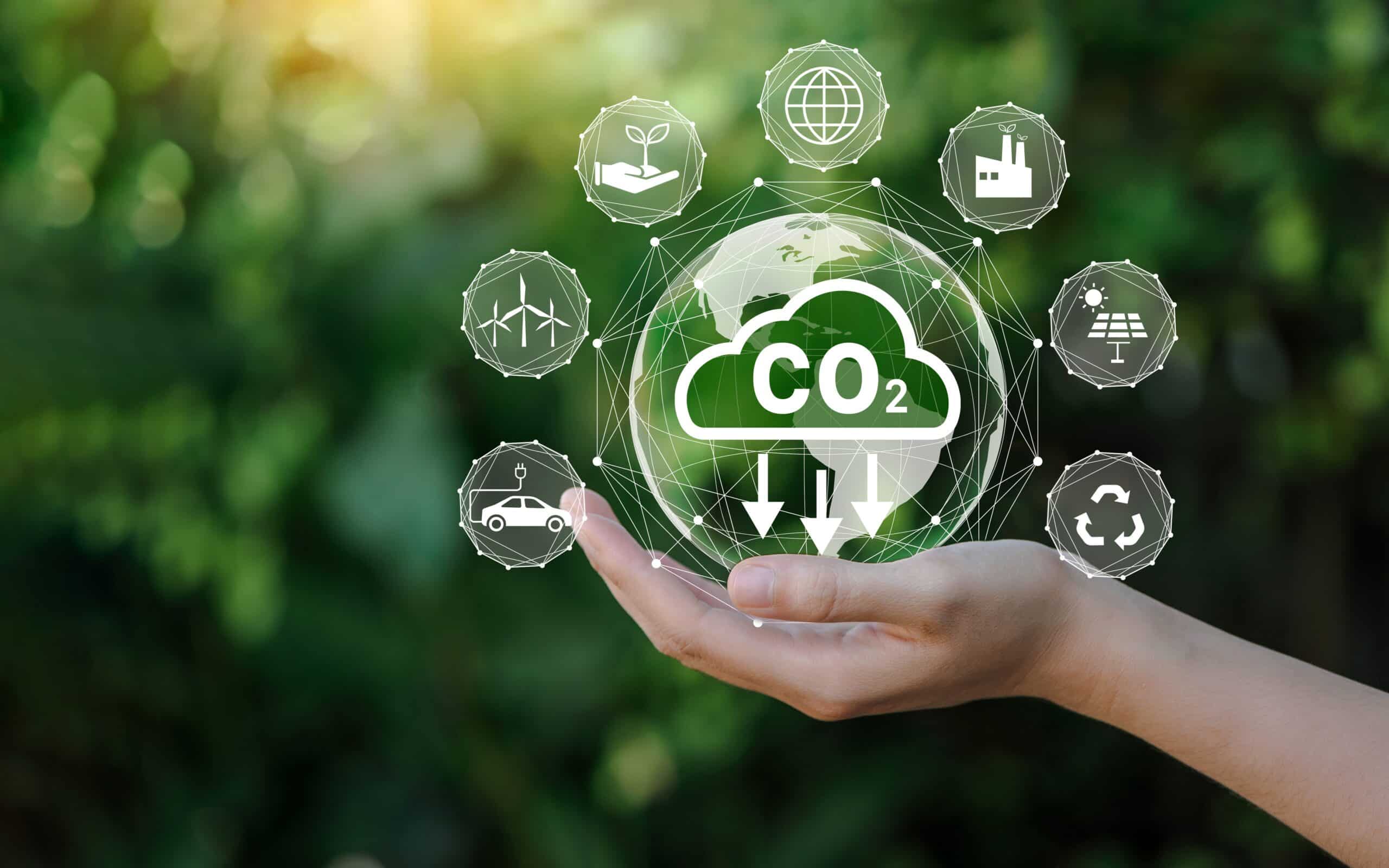 Reduce,Co2,Emission,Concept,In,The,Hand,For,Environmental,,Global